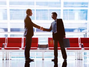two men shaking hands, one of whom is a best-in-class CPA based in San Francisco